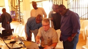 Surrounded by people and computers! Ken's favorite things!